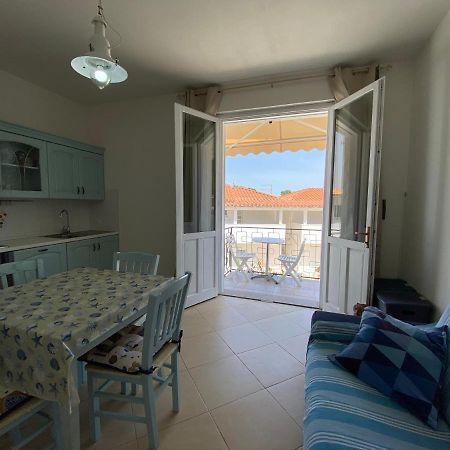 Sabrina Apartments Porto Pino Bagian luar foto