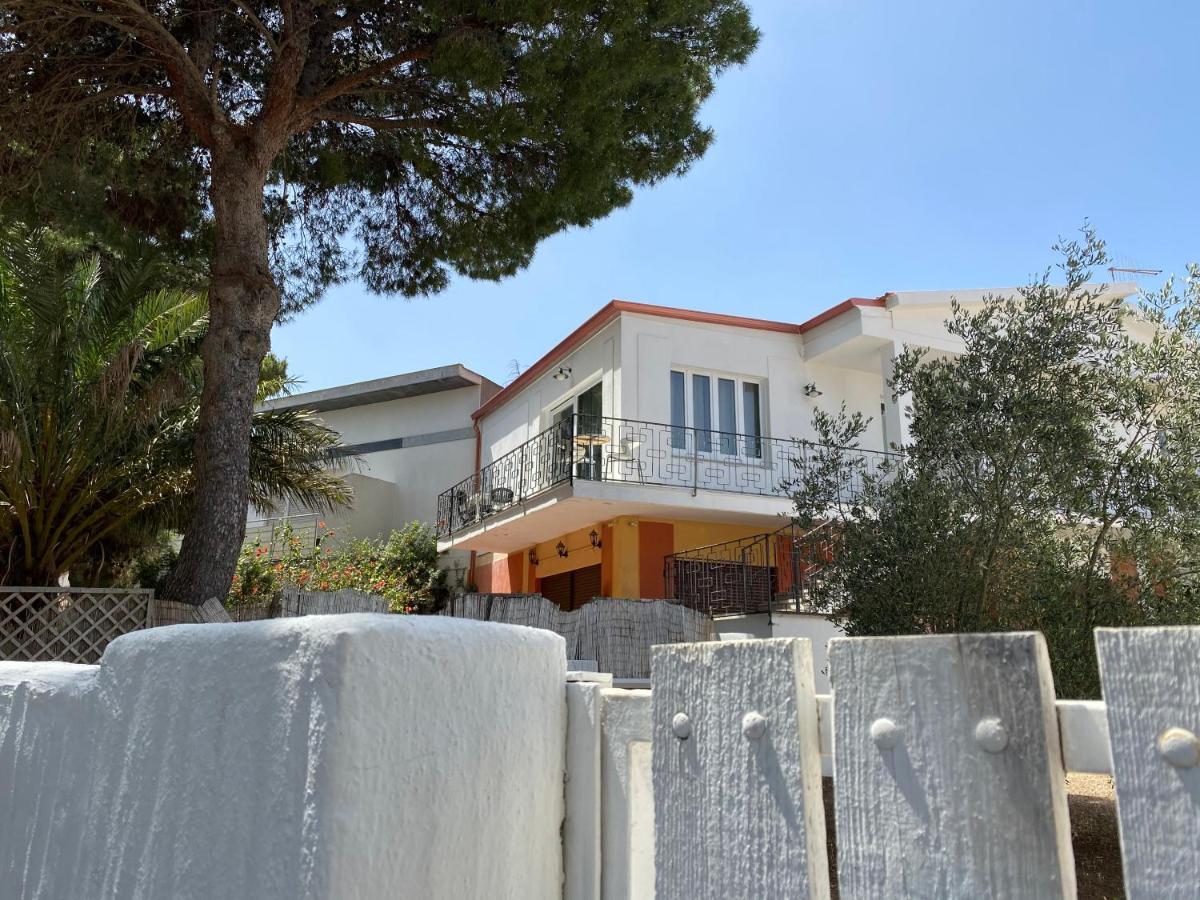 Sabrina Apartments Porto Pino Bagian luar foto