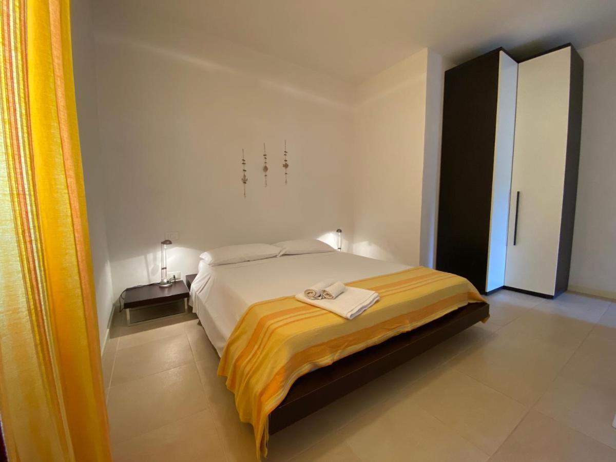Sabrina Apartments Porto Pino Bagian luar foto