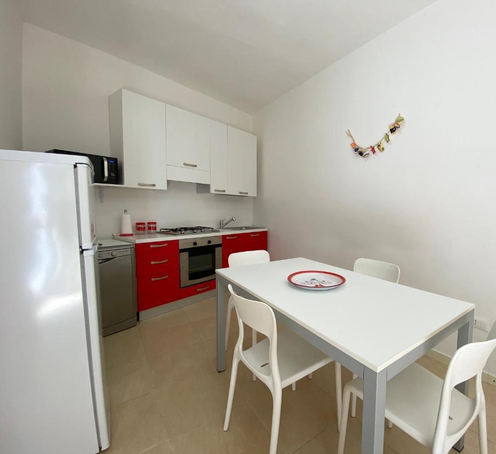 Sabrina Apartments Porto Pino Bagian luar foto