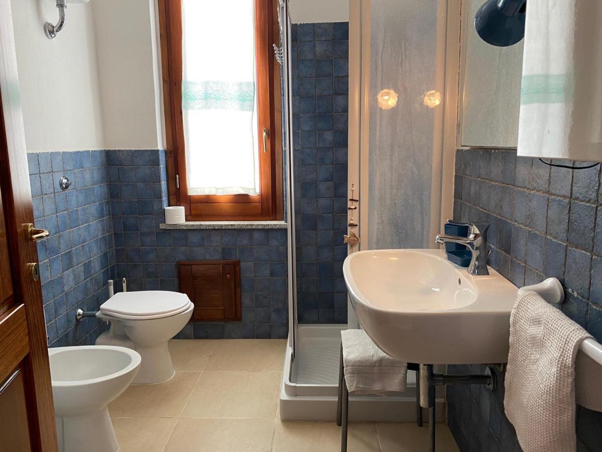 Sabrina Apartments Porto Pino Bagian luar foto