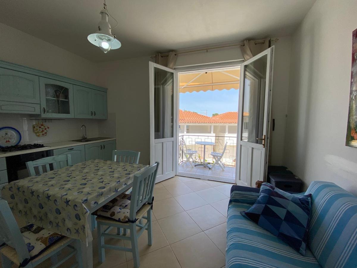 Sabrina Apartments Porto Pino Bagian luar foto