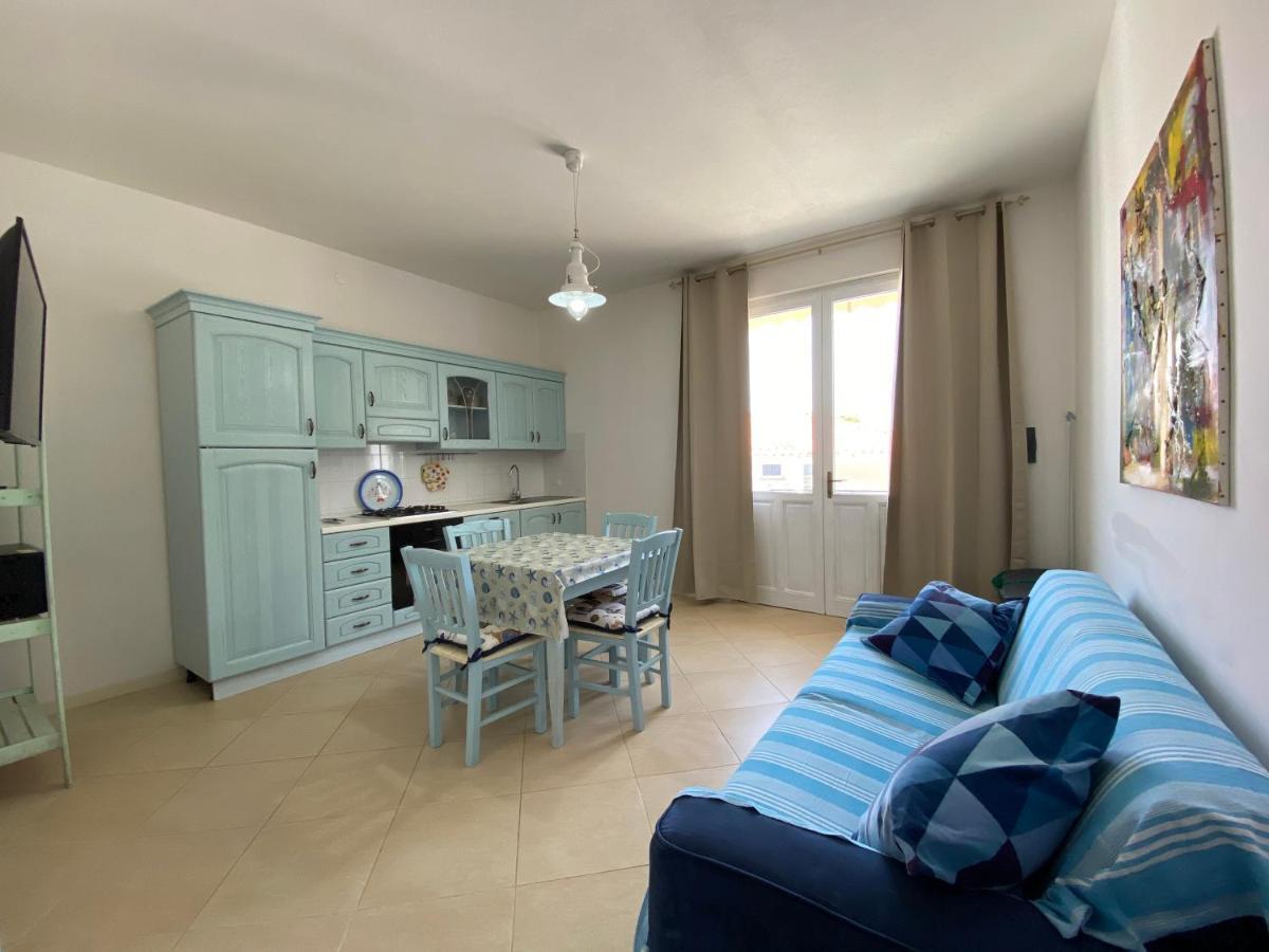 Sabrina Apartments Porto Pino Bagian luar foto