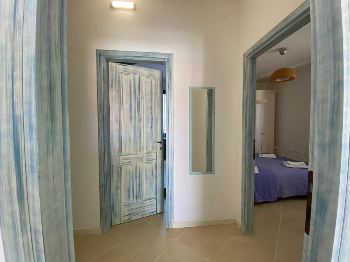 Sabrina Apartments Porto Pino Bagian luar foto