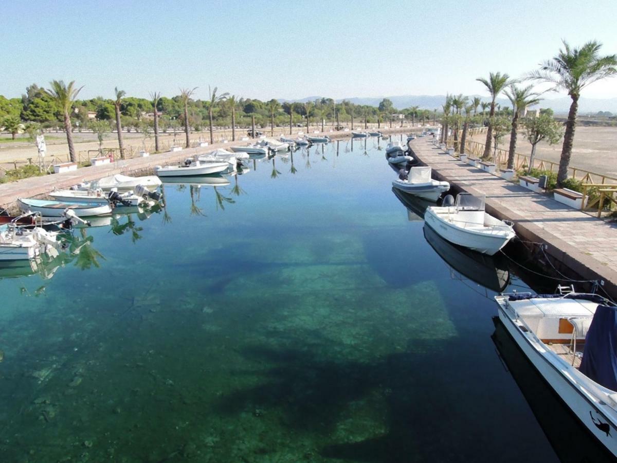 Sabrina Apartments Porto Pino Bagian luar foto